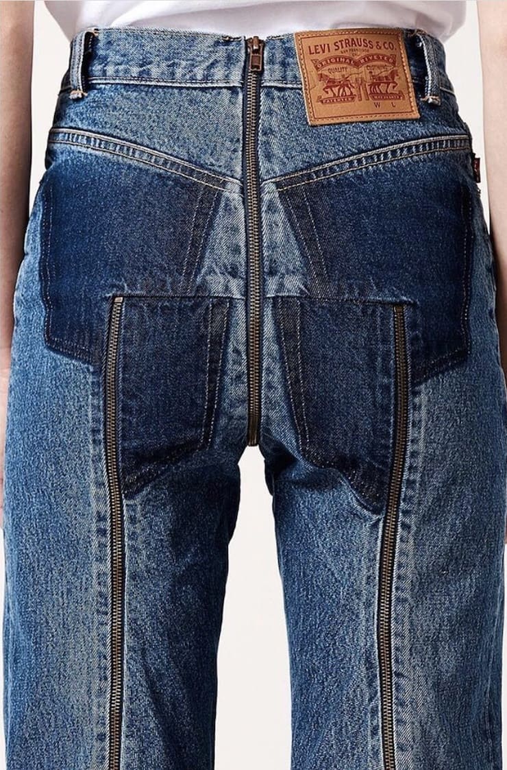 Jeans with patches and zippers